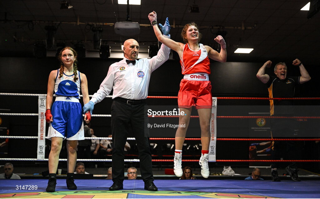 30 May 2025; Abby Murray of Muskerry BC, right, celebrates after winning her bout against Evelyn Spicer of Enniskerry BC during the 2025 National Senior Cadet Championship Finals at the National Boxing Stadium in Dublin. Photo by David Fitzgerald/Sportsfile