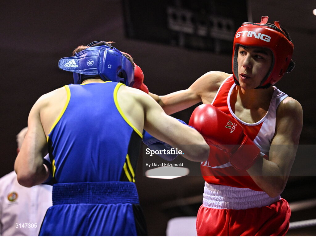 30 May 2025; Emmet Shields of Glasnevin BC, right, in action against Aodh Carlyle of Golden Cobra BC during their bout at the 2025 National Senior Cadet Championship Finals at the National Boxing Stadium in Dublin. Photo by David Fitzgerald/Sportsfile