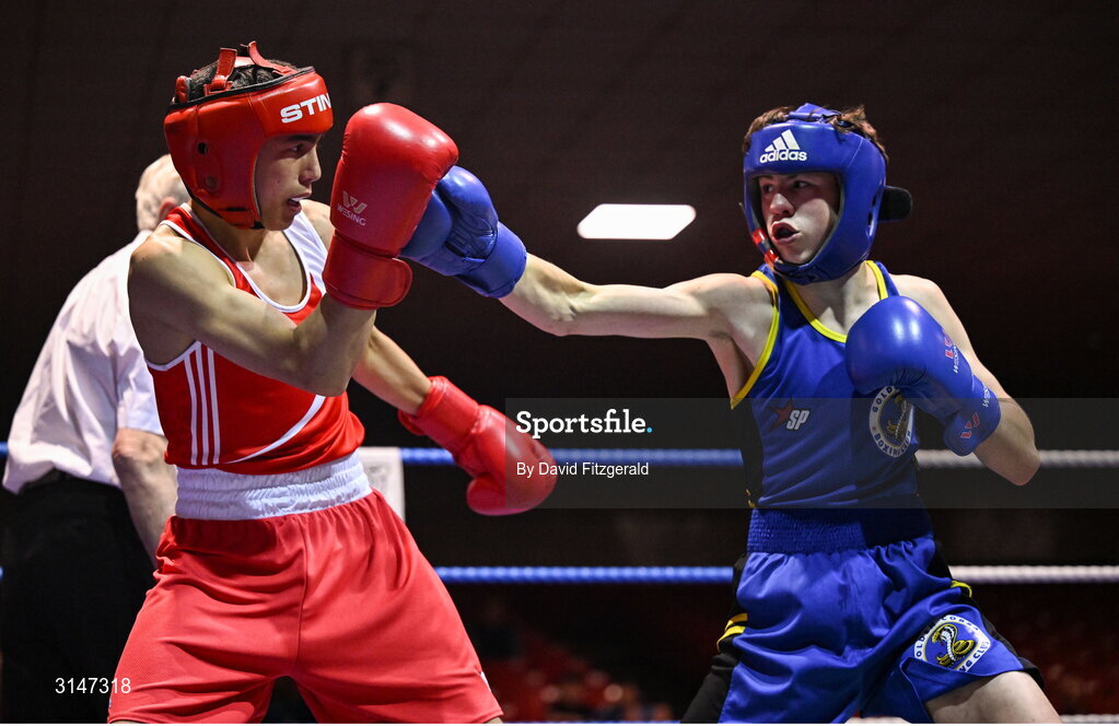 30 May 2025; Aodh Carlyle of Golden Cobra BC, right, in action against Emmet Shields of Glasnevin BC during their bout at the 2025 National Senior Cadet Championship Finals at the National Boxing Stadium in Dublin. Photo by David Fitzgerald/Sportsfile