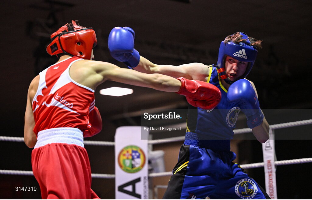 30 May 2025; Aodh Carlyle of Golden Cobra BC, right, in action against Emmet Shields of Glasnevin BC during their bout at the 2025 National Senior Cadet Championship Finals at the National Boxing Stadium in Dublin. Photo by David Fitzgerald/Sportsfile