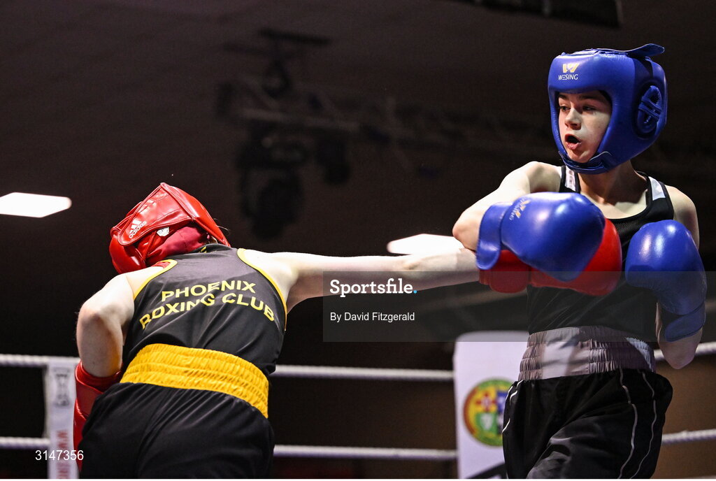 30 May 2025; Alanna Murphy of Ballybrack BC, right, in action against Lucy Prentice of Phoenix BC during their bout at the 2025 National Senior Cadet Championship Finals at the National Boxing Stadium in Dublin. Photo by David Fitzgerald/Sportsfile
