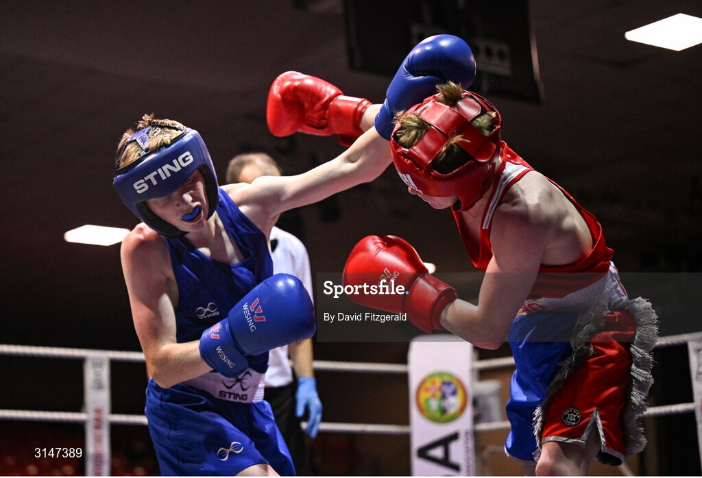 30 May 2025; Sean Kelly of St Abbans/Kilmyshall BC, left, in action against Jack Jones of Sacred Heart D during their bout at the 2025 National Senior Cadet Championship Finals at the National Boxing Stadium in Dublin. Photo by David Fitzgerald/Sportsfile