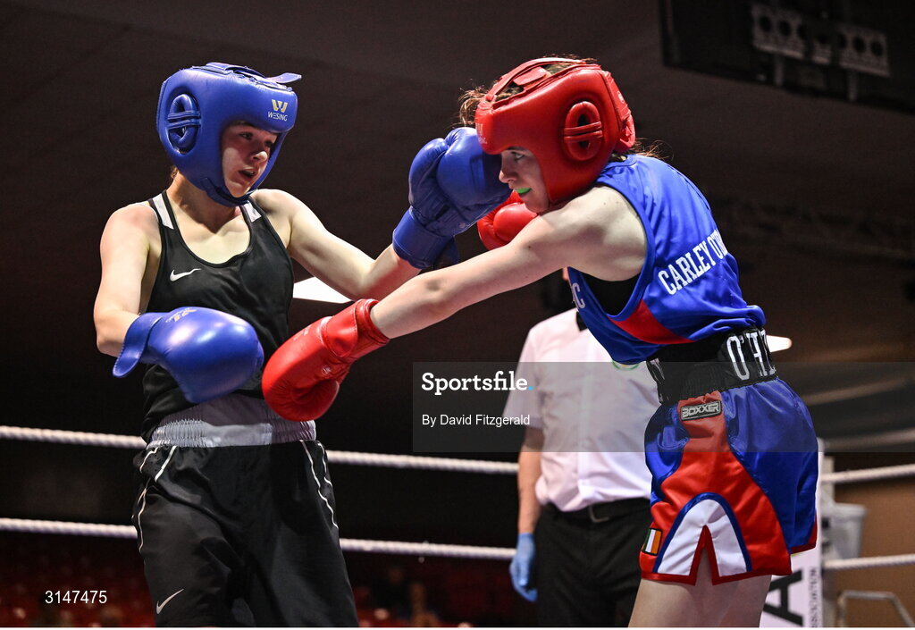 30 May 2025; Aliegha Murphy of Ballybrack BC, left, in action against Carly O’Herrin of Rochfortbridge BC during their bout at the 2025 National Senior Cadet Championship Finals at the National Boxing Stadium in Dublin. Photo by David Fitzgerald/Sportsfile