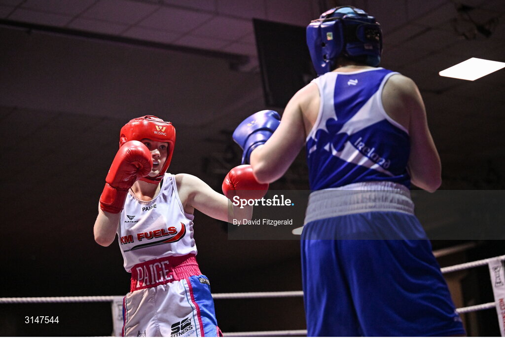 30 May 2025; Paige Nickels of Banbridge BC, left, in action against Ella Archbold of Ballybrack BC during their bout at the 2025 National Senior Cadet Championship Finals at the National Boxing Stadium in Dublin. Photo by David Fitzgerald/Sportsfile