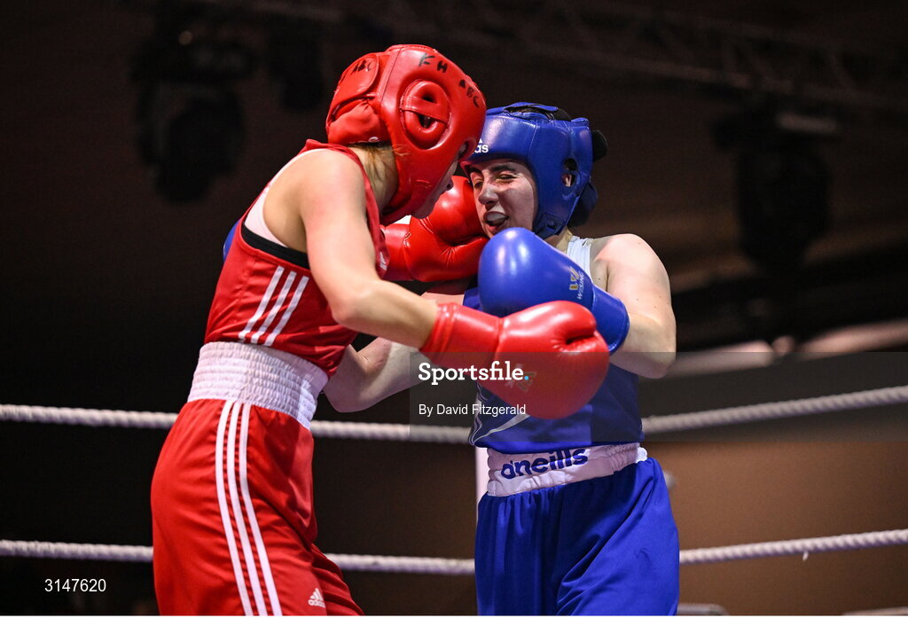 30 May 2025; Caoimhe Desmond of Fr Horgan's BC, left, and Vanessa Doyle of Templemore BC during their bout at the 2025 National Senior Cadet Championship Finals at the National Boxing Stadium in Dublin. Photo by David Fitzgerald/Sportsfile