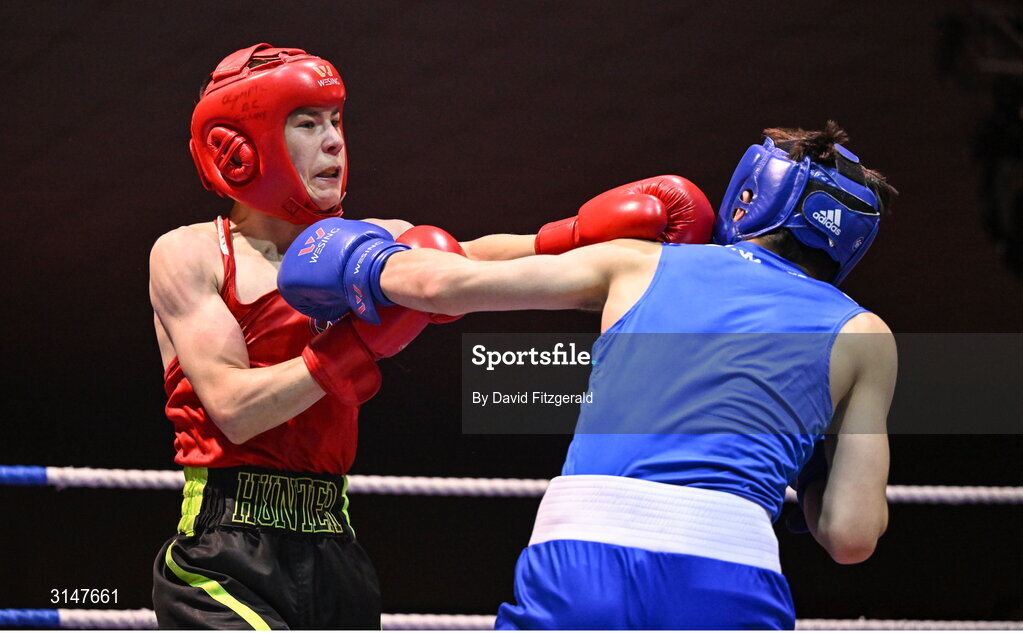 30 May 2025; John Nevin of Olympic G, left, in action against Kalib Walshe of Waterford CBS during their bout at the 2025 National Senior Cadet Championship Finals at the National Boxing Stadium in Dublin. Photo by David Fitzgerald/Sportsfile