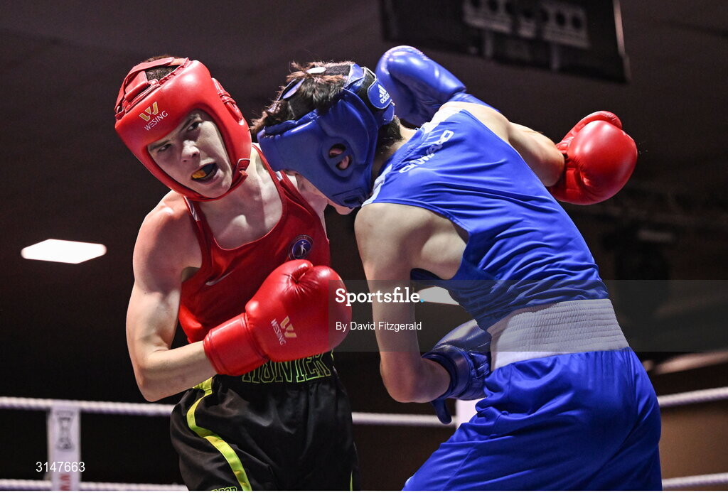 30 May 2025; John Nevin of Olympic G, left, in action against Kalib Walshe of Waterford CBS during their bout at the 2025 National Senior Cadet Championship Finals at the National Boxing Stadium in Dublin. Photo by David Fitzgerald/Sportsfile