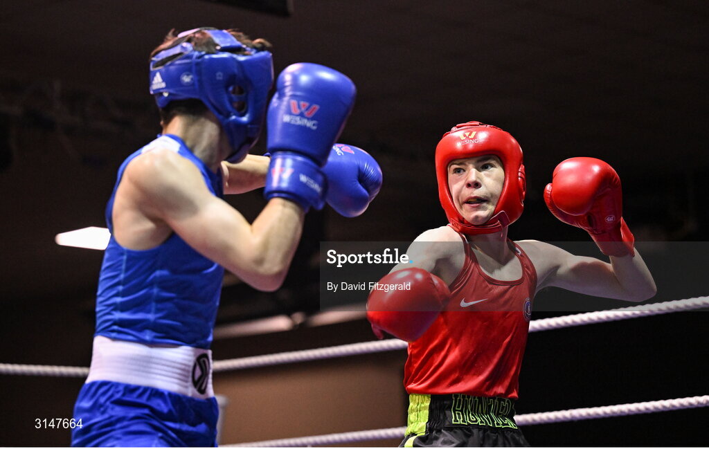 30 May 2025; John Nevin of Olympic G, right, in action against Kalib Walshe of Waterford CBS during their bout at the 2025 National Senior Cadet Championship Finals at the National Boxing Stadium in Dublin. Photo by David Fitzgerald/Sportsfile