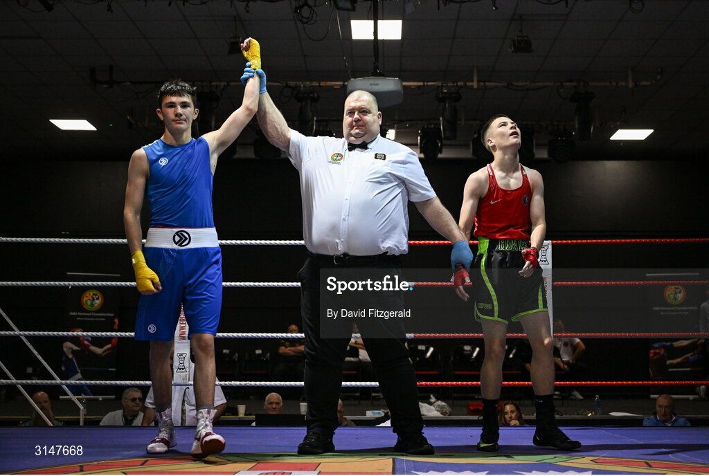 30 May 2025; Kalib Walshe of Waterford CBS, left, celebrates after winning his bout against John Nevin of Olympic G during the 2025 National Senior Cadet Championship Finals at the National Boxing Stadium in Dublin. Photo by David Fitzgerald/Sportsfile