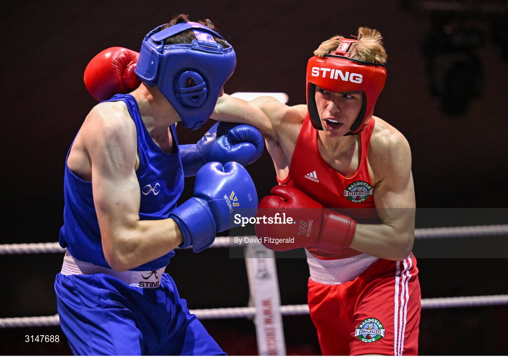 30 May 2025; Phoenix Kenny of Baldoyle BC, right, in action against Lorcan Holohan of Portlaoise BC during their bout at the 2025 National Senior Cadet Championship Finals at the National Boxing Stadium in Dublin. Photo by David Fitzgerald/Sportsfile