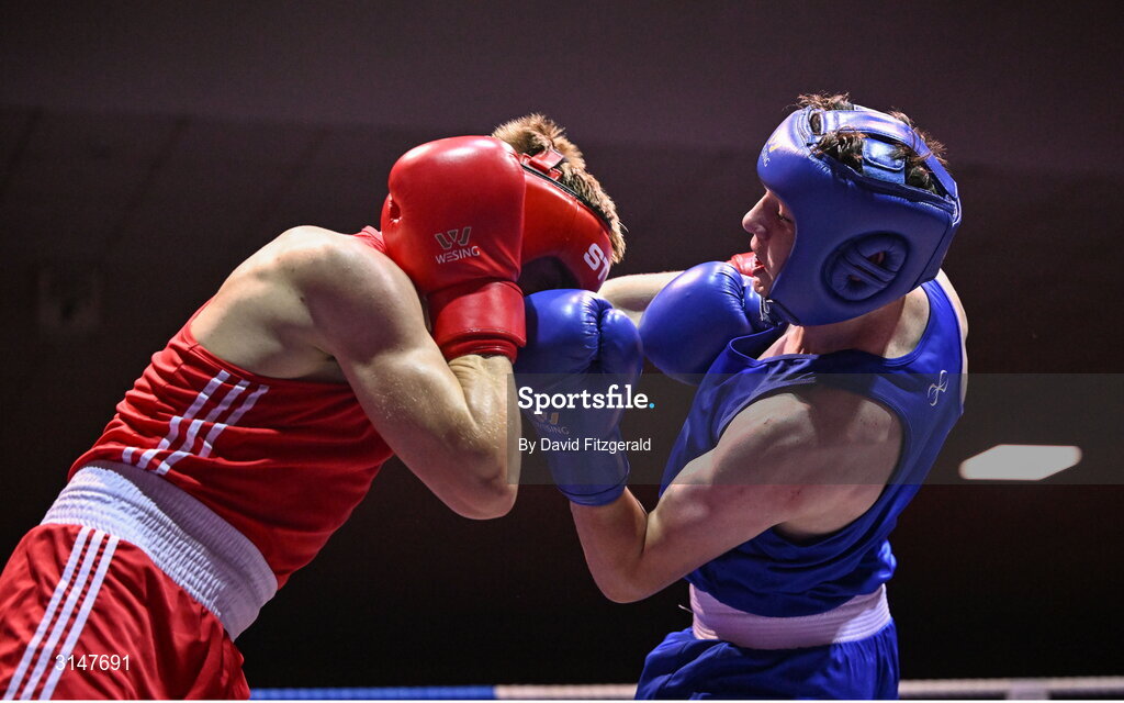 30 May 2025; Lorcan Holohan of Portlaoise BC, right, iaa Phoenix Kenny of Baldoyle BC during their bout at the 2025 National Senior Cadet Championship Finals at the National Boxing Stadium in Dublin. Photo by David Fitzgerald/Sportsfile
