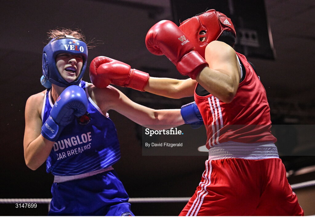 30 May 2025; Alesha Mullis Boyle of Dungloe BC, left, in action against Ella Leonard of Monivea BC during their bout at the 2025 National Senior Cadet Championship Finals at the National Boxing Stadium in Dublin. Photo by David Fitzgerald/Sportsfile