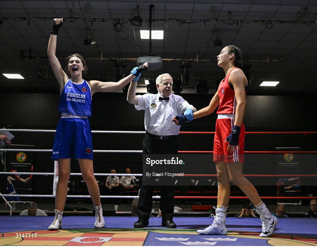 30 May 2025; Alesha Mullis Boyle of Dungloe BC, left, celebrates after winning her bout against Ella Leonard of Monivea BC during the 2025 National Senior Cadet Championship Finals at the National Boxing Stadium in Dublin. Photo by David Fitzgerald/Sportsfile