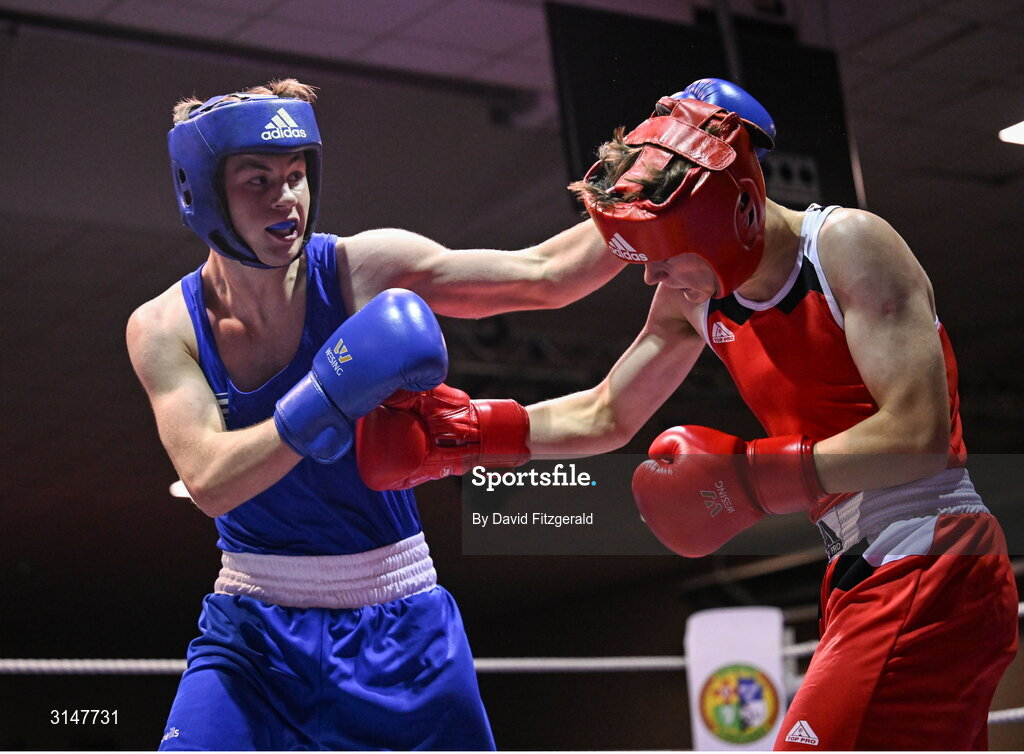 30 May 2025; Darren O’Toole of Jobstown BC, left, in action against Niall O’Driscoll of Muskerry BC during their bout at the 2025 National Senior Cadet Championship Finals at the National Boxing Stadium in Dublin. Photo by David Fitzgerald/Sportsfile