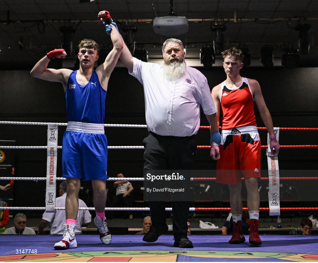 30 May 2025; Darren O’Toole of Jobstown BC, left, celebrates after winning his bout against Niall O’Driscoll of Muskerry BC during the 2025 National Senior Cadet Championship Finals at the National Boxing Stadium in Dublin. Photo by David Fitzgerald/Sportsfile