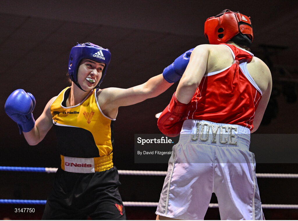 30 May 2025; Cassie Henderson of Phoenix BC, left, in action against Kaysie Joyce of Clonmel BC during their bout at the 2025 National Senior Cadet Championship Finals at the National Boxing Stadium in Dublin. Photo by David Fitzgerald/Sportsfile
