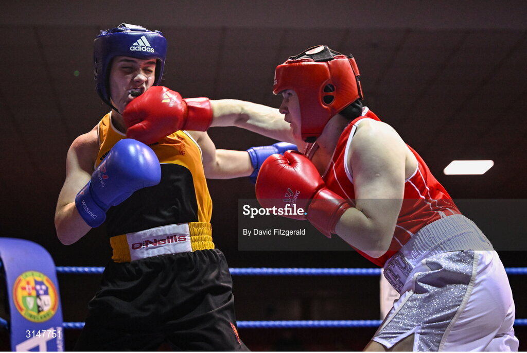 30 May 2025; Cassie Henderson of Phoenix BC, left, in action against Kaysie Joyce of Clonmel BC during their bout at the 2025 National Senior Cadet Championship Finals at the National Boxing Stadium in Dublin. Photo by David Fitzgerald/Sportsfile