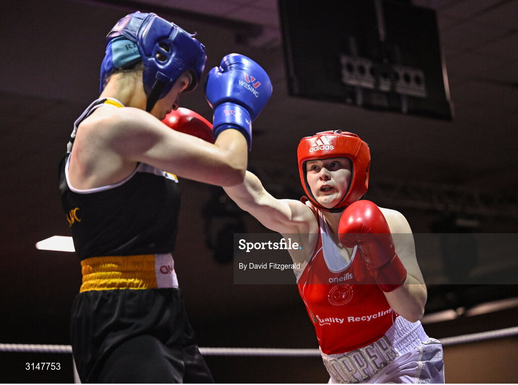 30 May 2025; Kaysie Joyce of Clonmel BC, right, in action against Cassie Henderson of Phoenix BC during their bout at the 2025 National Senior Cadet Championship Finals at the National Boxing Stadium in Dublin. Photo by David Fitzgerald/Sportsfile
