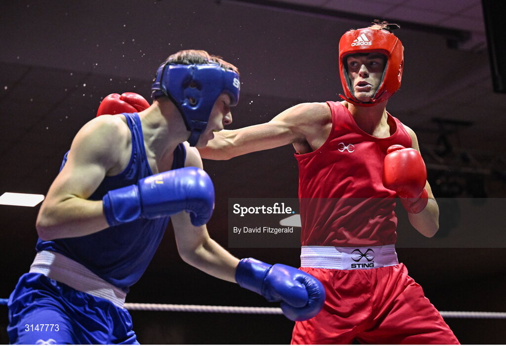 30 May 2025; Martin Sweeney of Galway BC, right, in action against Hughie Lee Nevin of Sacred Heart D during their bout at the 2025 National Senior Cadet Championship Finals at the National Boxing Stadium in Dublin. Photo by David Fitzgerald/Sportsfile