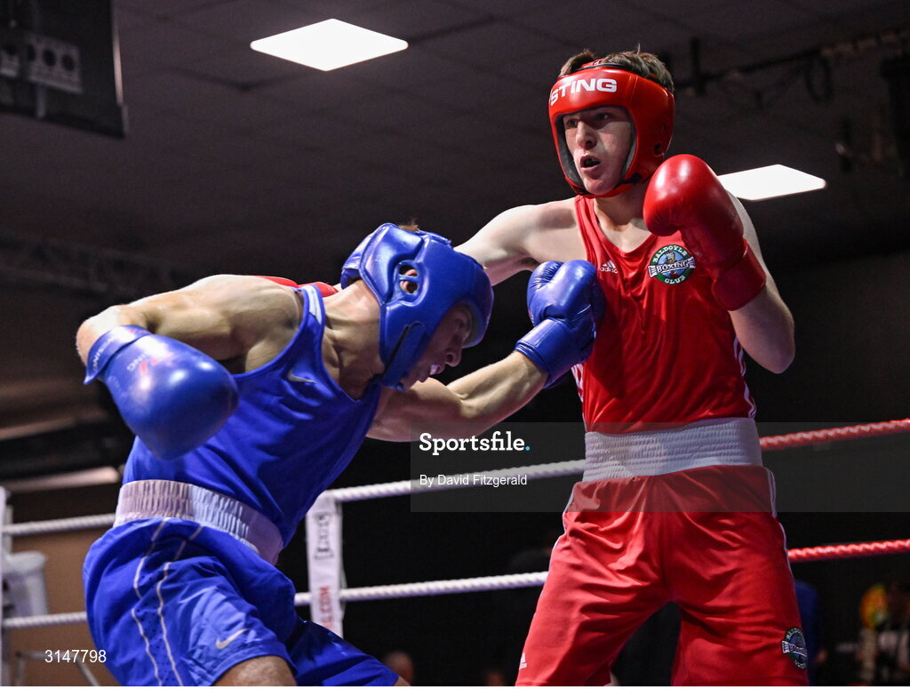 30 May 2025; Martin Collins of Baldoyle BC, right, in action against John Ward of Monivea BC during their bout at the 2025 National Senior Cadet Championship Finals at the National Boxing Stadium in Dublin. Photo by David Fitzgerald/Sportsfile