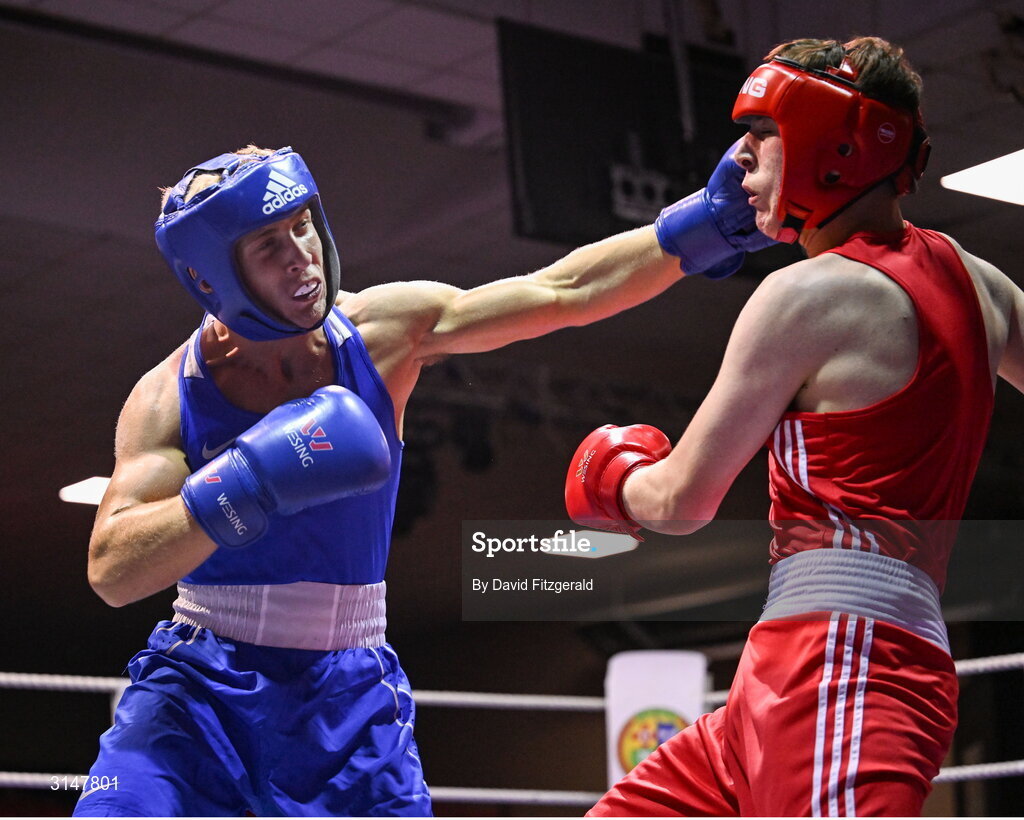 30 May 2025; John Ward of Monivea BC, left, in action against Martin Collins of Baldoyle BC during their bout at the 2025 National Senior Cadet Championship Finals at the National Boxing Stadium in Dublin. Photo by David Fitzgerald/Sportsfile