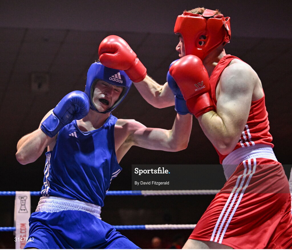 30 May 2025; Senan Kennedy of Cabra BC, left, in action against Sean Doohan of Dunfanaghy BC during their bout at the 2025 National Senior Cadet Championship Finals at the National Boxing Stadium in Dublin. Photo by David Fitzgerald/Sportsfile
