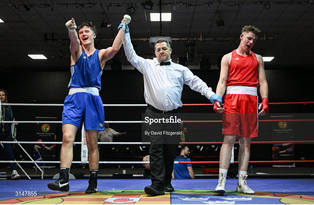 30 May 2025; Senan Kennedy of Cabra BC, left, celebrates after winning his bout against Sean Doohan of Dunfanaghy BC during the 2025 National Senior Cadet Championship Finals at the National Boxing Stadium in Dublin. Photo by David Fitzgerald/Sportsfile