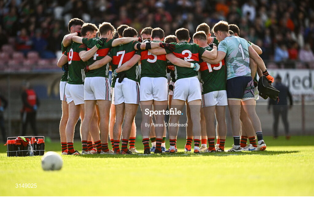 31 May 2025; Mayo players in a huddle before the GAA Football All-Ireland Senior Championship Round 2 match between Tyrone and Mayo at O'Neills Healy Park in Omagh, Tyrone. Photo by Piaras Ó Mídheach/Sportsfile