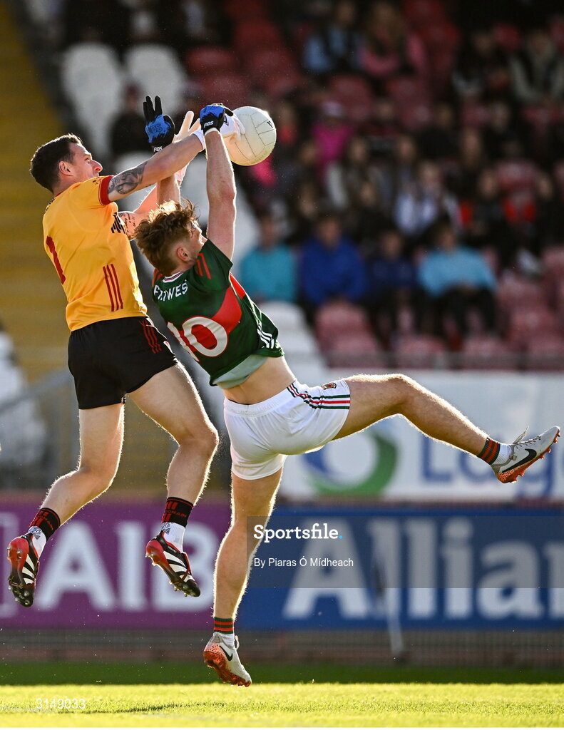 31 May 2025; Tyrone goalkeeper Niall Morgan in action against Jack Carney of Mayo during the GAA Football All-Ireland Senior Championship Round 2 match between Tyrone and Mayo at O'Neills Healy Park in Omagh, Tyrone. Photo by Piaras Ó Mídheach/Sportsfile