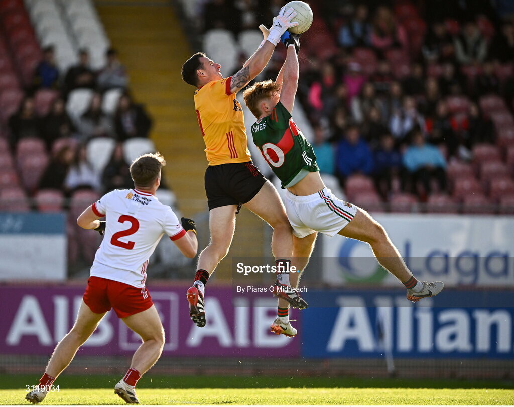 31 May 2025; Tyrone goalkeeper Niall Morgan in action against Jack Carney of Mayo during the GAA Football All-Ireland Senior Championship Round 2 match between Tyrone and Mayo at O'Neills Healy Park in Omagh, Tyrone. Photo by Piaras Ó Mídheach/Sportsfile