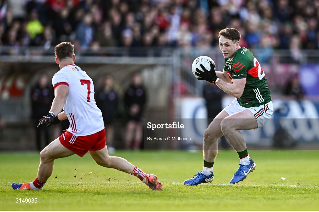 31 May 2025; Paddy Durcan of Mayo in action against Kieran McGeary of Tyrone during the GAA Football All-Ireland Senior Championship Round 2 match between Tyrone and Mayo at O'Neills Healy Park in Omagh, Tyrone. Photo by Piaras Ó Mídheach/Sportsfile