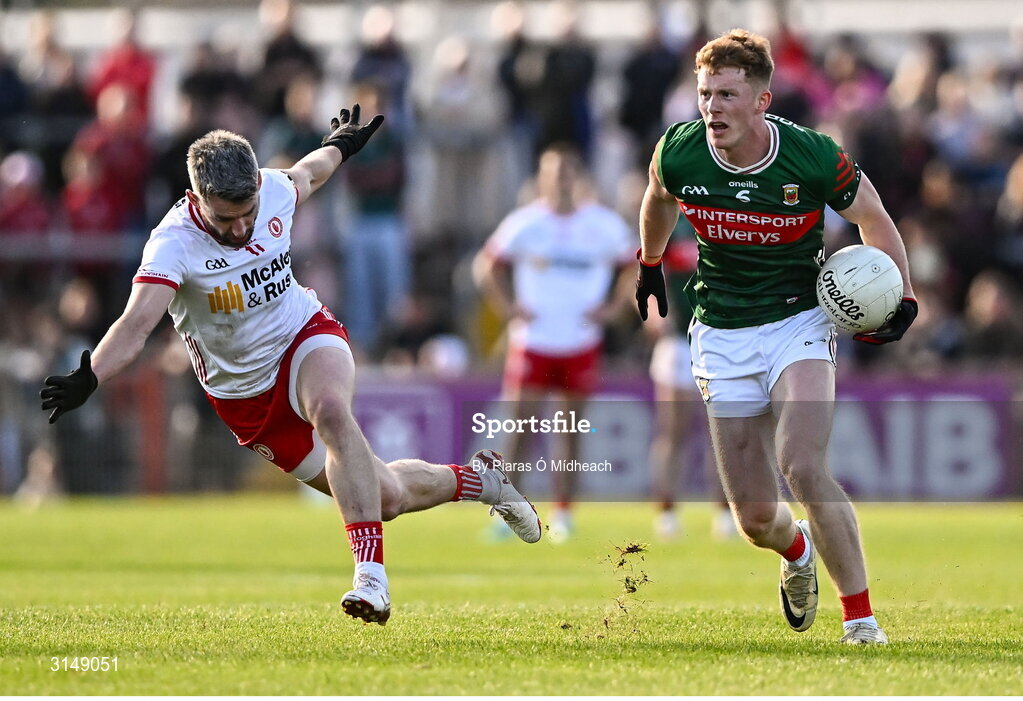 31 May 2025; David McBrien of Mayo in action against Mattie Donnelly of Tyrone during the GAA Football All-Ireland Senior Championship Round 2 match between Tyrone and Mayo at O'Neills Healy Park in Omagh, Tyrone. Photo by Piaras Ó Mídheach/Sportsfile