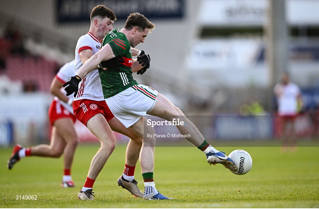 31 May 2025; Paddy Durcan of Mayo in action against Ciaran Daly of Tyrone during the GAA Football All-Ireland Senior Championship Round 2 match between Tyrone and Mayo at O'Neills Healy Park in Omagh, Tyrone. Photo by Piaras Ó Mídheach/Sportsfile