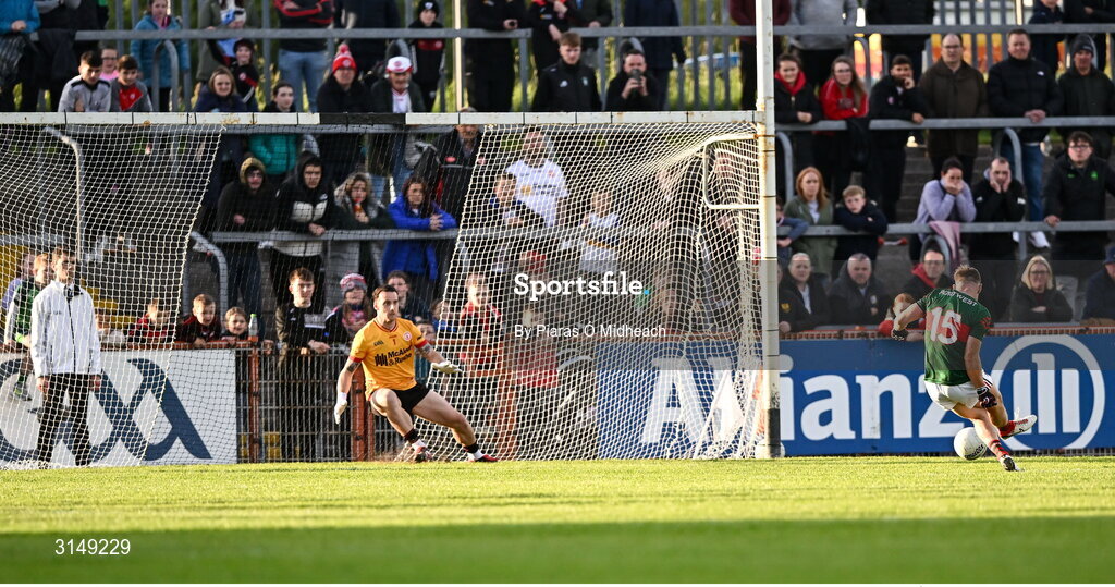 31 May 2025; Ryan O’Donoghue of Mayo scores his side's second goal, a penalty, past Tyrone goalkeeper Niall Morgan during the GAA Football All-Ireland Senior Championship Round 2 match between Tyrone and Mayo at O'Neills Healy Park in Omagh, Tyrone. Photo by Piaras Ó Mídheach/Sportsfile
