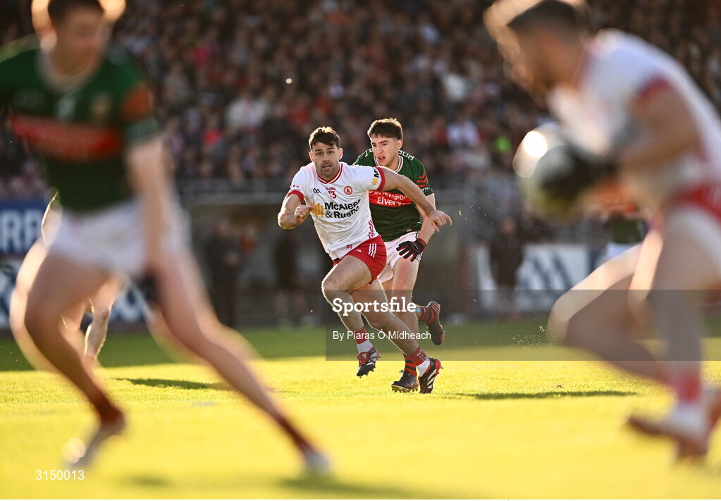 31 May 2025; Darren McCurry of Tyrone makes a support run, chased by Enda Hession of Mayo, as Mattie Donnelly of Tyrone goes on the attack during the GAA Football All-Ireland Senior Championship Round 2 match between Tyrone and Mayo at O'Neills Healy Park in Omagh, Tyrone. Photo by Piaras Ó Mídheach/Sportsfile