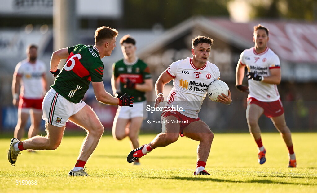 31 May 2025; Michael McKernan of Tyrone in action against David McBrien of Mayo during the GAA Football All-Ireland Senior Championship Round 2 match between Tyrone and Mayo at O'Neills Healy Park in Omagh, Tyrone. Photo by Piaras Ó Mídheach/Sportsfile