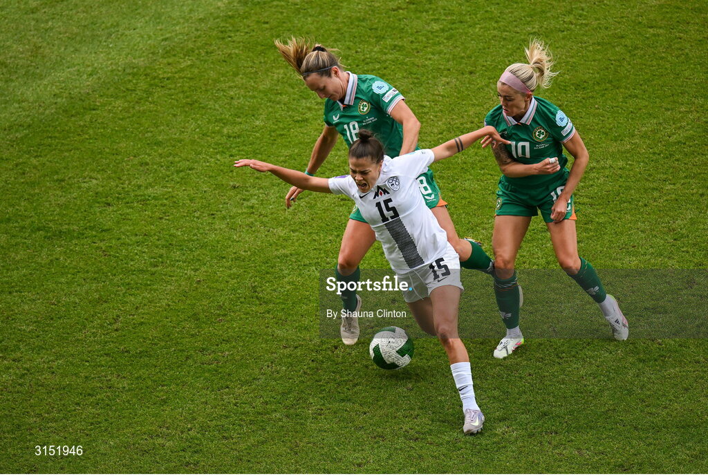 3 June 2025; Sara Makovec of Slovenia is tackled by Kyra Carusa and Anna Patten of Republic of Ireland during the UEFA Women's Nations League, League B match between Republic of Ireland and Slovenia at Páirc Uí Chaoimh in Cork. Photo by Shauna Clinton/Sportsfile