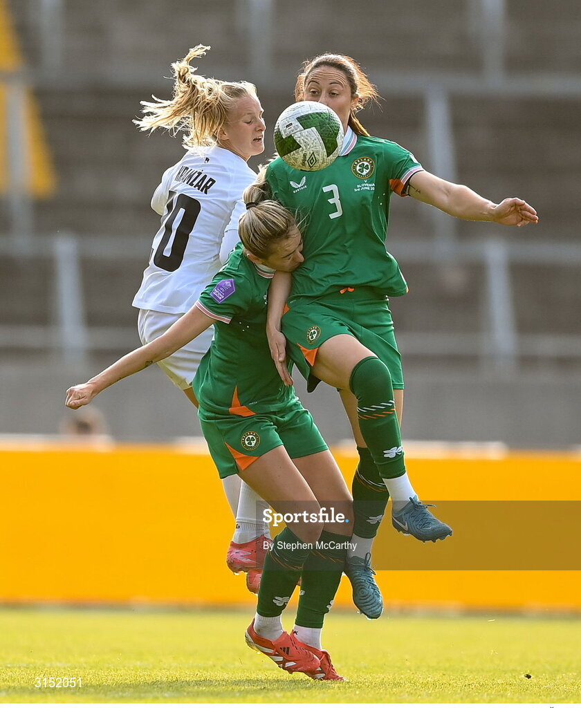 3 June 2025; Megan Campbell and Megan Connolly of Republic of Ireland contest a header with Dominika Conc of Slovenia during the UEFA Women's Nations League, League B match between Republic of Ireland and Slovenia at Páirc Uí Chaoimh in Cork. Photo by Stephen McCarthy/Sportsfile