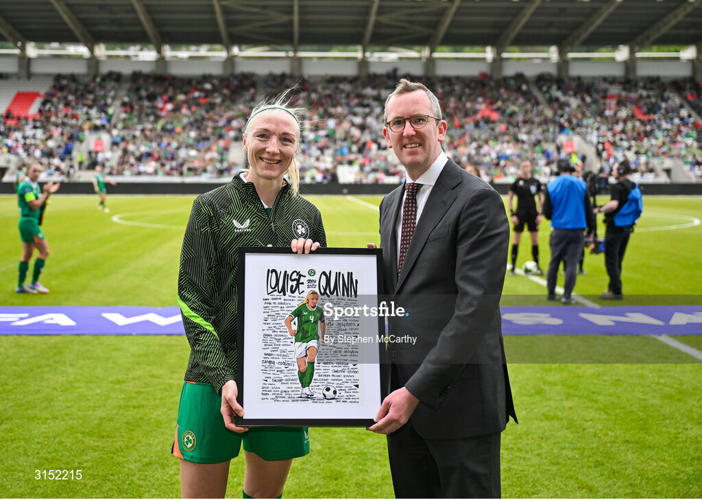 3 June 2025; FAI chief executive officer David Courell makes a presentation to Republic of Ireland international Louise Quinn on the occasion of her last international game before the UEFA Women's Nations League, League B match between Republic of Ireland and Slovenia at Páirc Uí Chaoimh in Cork. Photo by Stephen McCarthy/Sportsfile