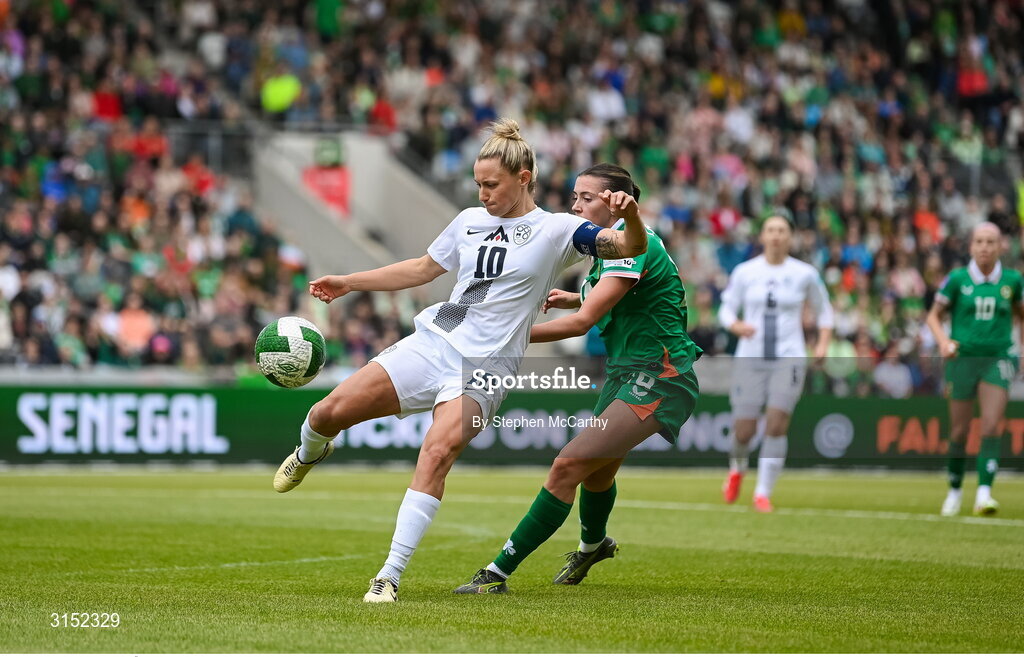 3 June 2025; Dominika Conc of Slovenia in action against Abbie Larkin of Republic of Ireland during the UEFA Women's Nations League, League B match between Republic of Ireland and Slovenia at Páirc Uí Chaoimh in Cork. Photo by Stephen McCarthy/Sportsfile