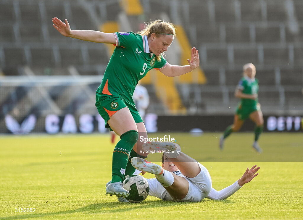 3 June 2025; Amber Barrett of Republic of Ireland is tackled by Sara Agrež of Slovenia during the UEFA Women's Nations League, League B match between Republic of Ireland and Slovenia at Páirc Uí Chaoimh in Cork. Photo by Stephen McCarthy/Sportsfile