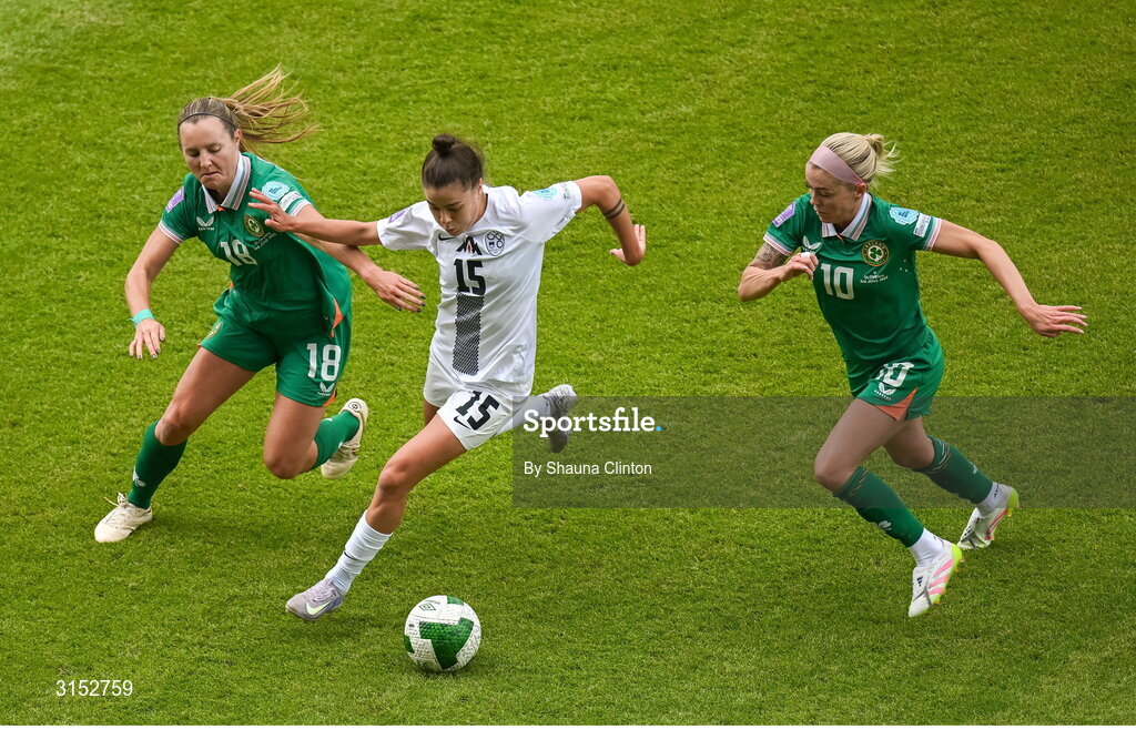 3 June 2025; Sara Makovec of Slovenia in action against Republic of Ireland players Kyra Carusa, left, and Denise O'Sullivan during the UEFA Women's Nations League, League B match between Republic of Ireland and Slovenia at Páirc Uí Chaoimh in Cork. Photo by Shauna Clinton/Sportsfile
