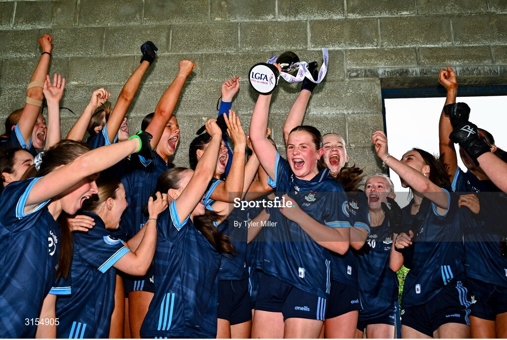 8 June 2025; Dublin captain Maeve Conlon lifts the cup after the LGFA All-Ireland U14 Gold Final match between Dublin and Kerry at Nenagh Éire Óg GAA Club in Nenagh, Tipperary. Photo by Tyler Miller/Sportsfile