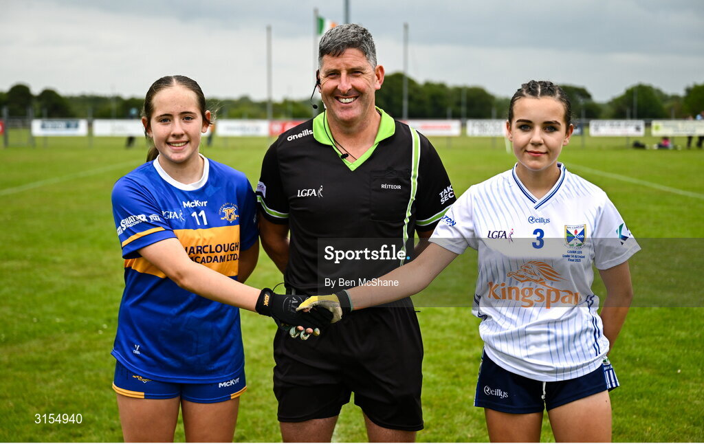 8 June 2025; Referee Conor McCarthy with Tipperary captain Farrah Madigan, left, and Cavan captain Nadine McKenna before the LGFA All-Ireland U14 Silver Final match between Tipperary and Cavan at Coralstown/Kinnegad GAA in Westmeath. Photo by Ben McShane/Sportsfile