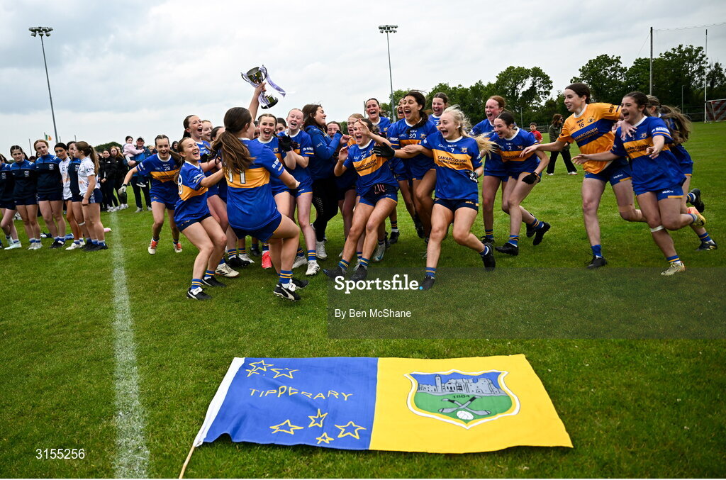 8 June 2025; Tipperary players celebrate with the cup after the LGFA All-Ireland U14 Silver Final match between Tipperary and Cavan at Coralstown/Kinnegad GAA in Westmeath. Photo by Ben McShane/Sportsfile