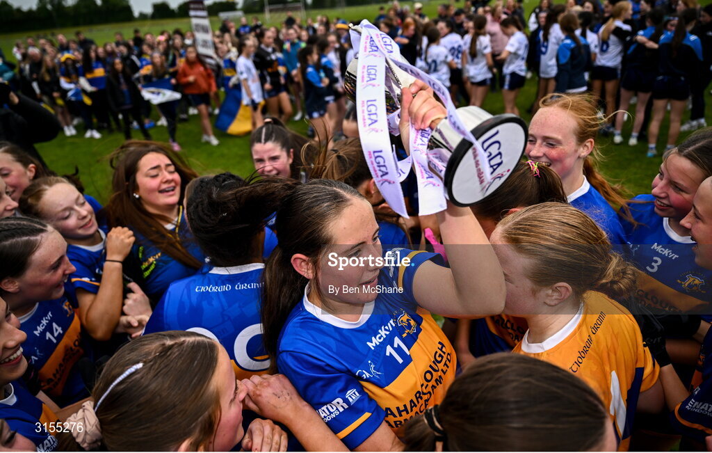 8 June 2025; Tipperary players celebrate with the cup after the LGFA All-Ireland U14 Silver Final match between Tipperary and Cavan at Coralstown/Kinnegad GAA in Westmeath. Photo by Ben McShane/Sportsfile