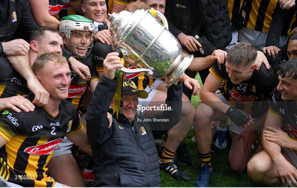 8 June 2025; Kilkenny kitman Dennis 'Rackard' Coady lifts the Bob O'Keeffe Cup surrounded by the Kilkenny team after winning  the Leinster GAA Senior Hurling Championship final match between Kilkenny and Galway at Croke Park in Dublin. Photo by John Sheridan/Sportsfile
