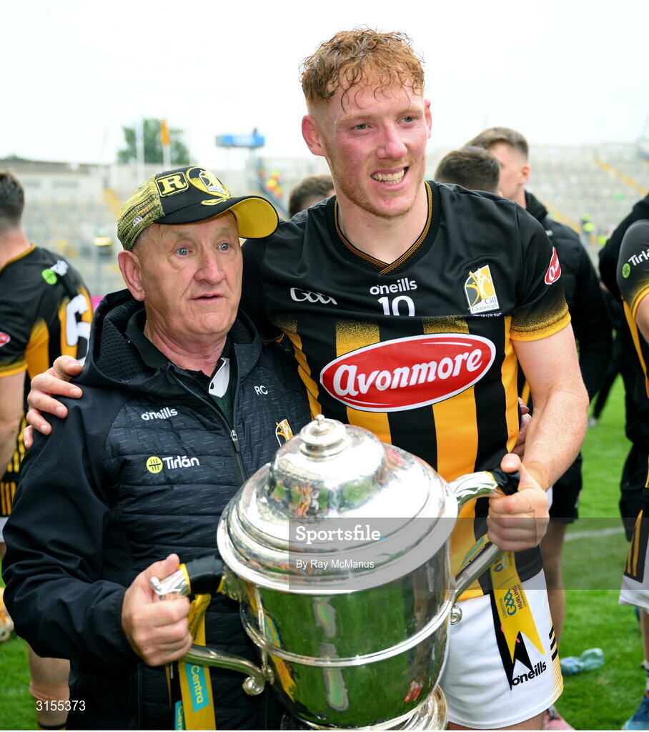 8 June 2025; Kilkenny kit man Rackard Cody, holding the Bob O'Keeffe Cup, celebrates with Kilkenny captain John Donnelly after the Leinster GAA Senior Hurling Championship final match between Kilkenny and Galway at Croke Park in Dublin. Photo by Ray McManus/Sportsfile