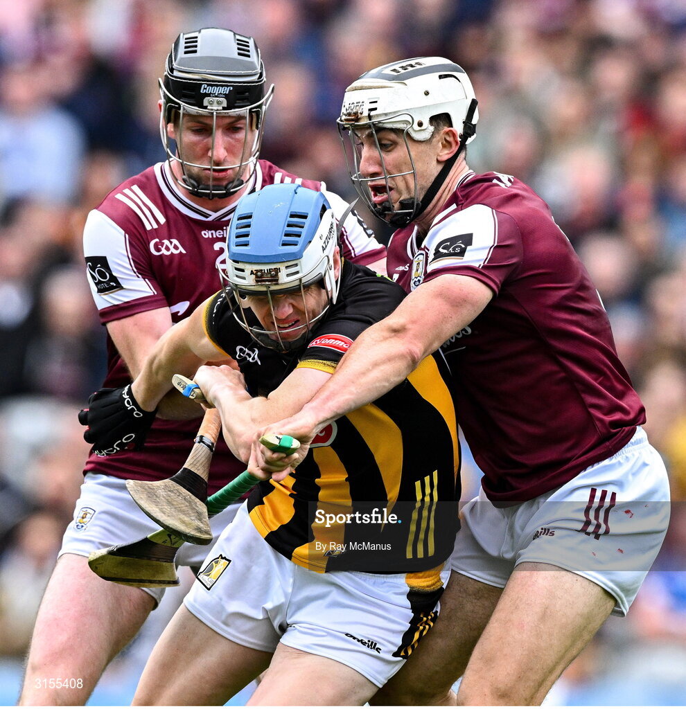 8 June 2025; TJ Reid of Kilkenny is tackled by Padraic Mannion of Galway and Daithí Burke of Galway during the Leinster GAA Senior Hurling Championship final match between Kilkenny and Galway at Croke Park in Dublin. Photo by Ray McManus/Sportsfile