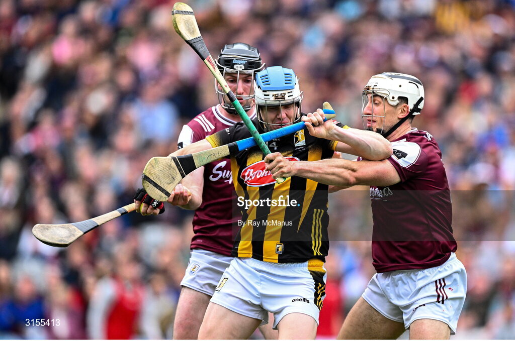 8 June 2025; TJ Reid of Kilkenny is tackled by Padraic Mannion of Galway and Daithí Burke of Galway during the Leinster GAA Senior Hurling Championship final match between Kilkenny and Galway at Croke Park in Dublin. Photo by Ray McManus/Sportsfile